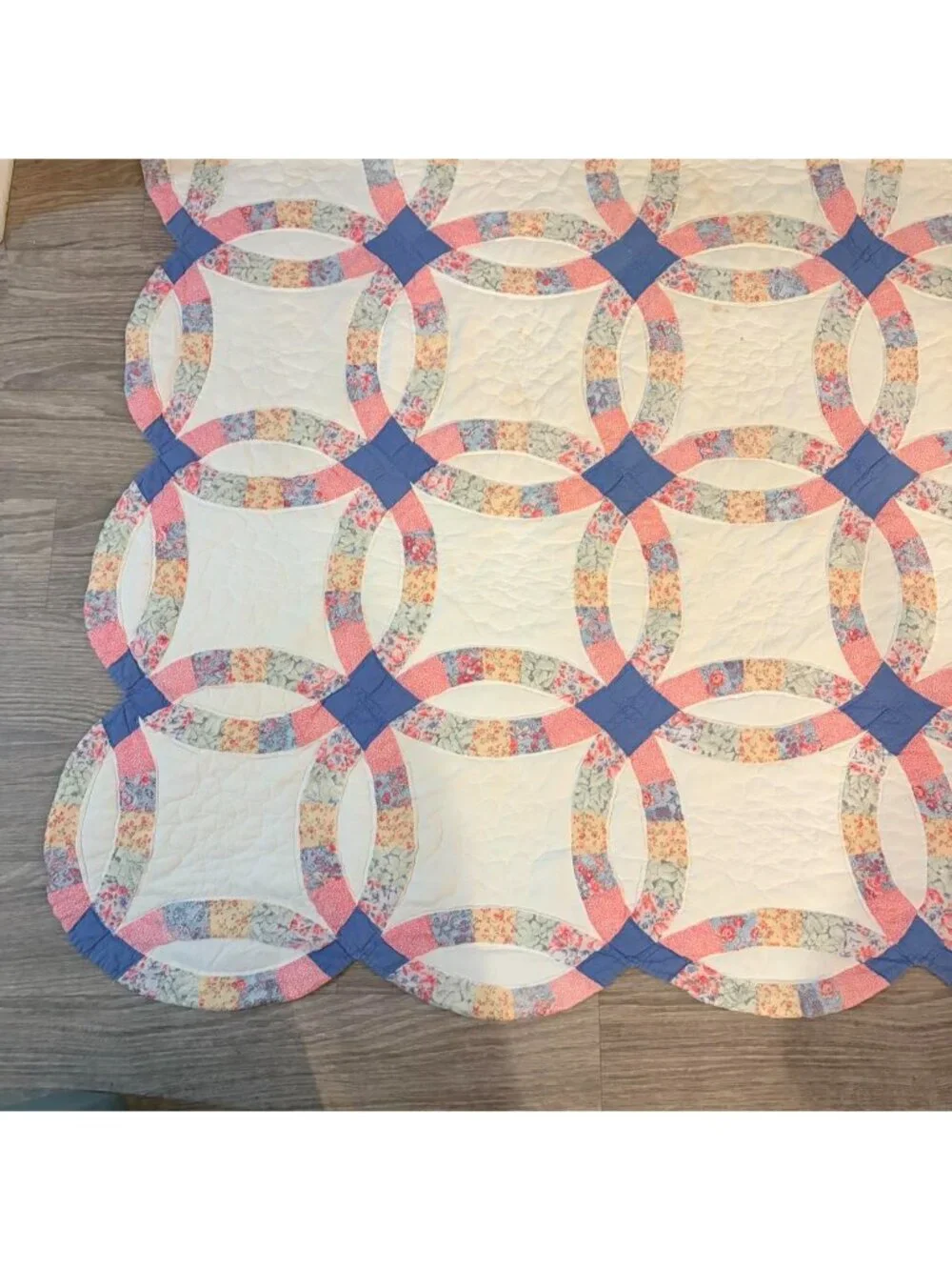 Vintage handmade pastel floral pink and blue wedding ring quilt blanket